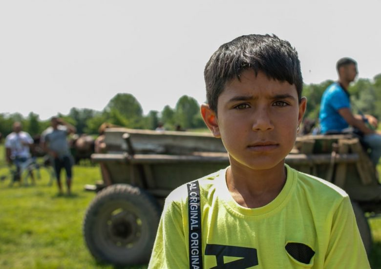 A boy at a REDI community gathering