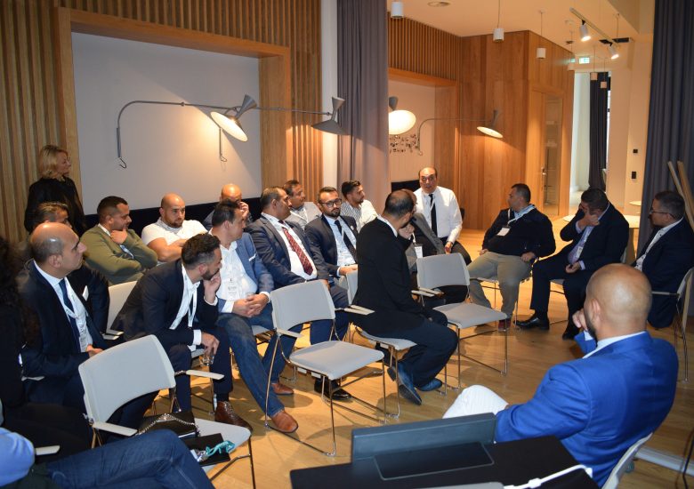 Audience listening during a REDI conference session